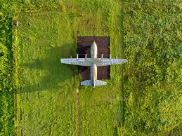 Visitors exploring Ta Con relics